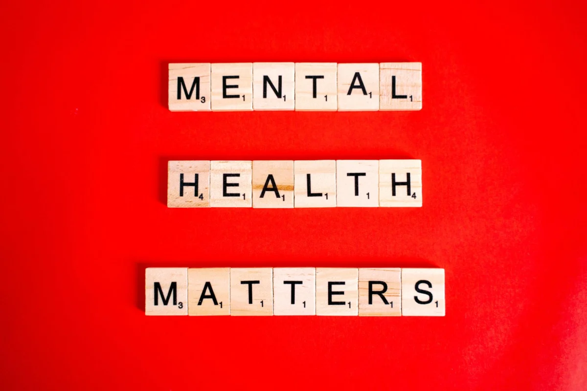 mental health matters spelled on letter tiles on red background